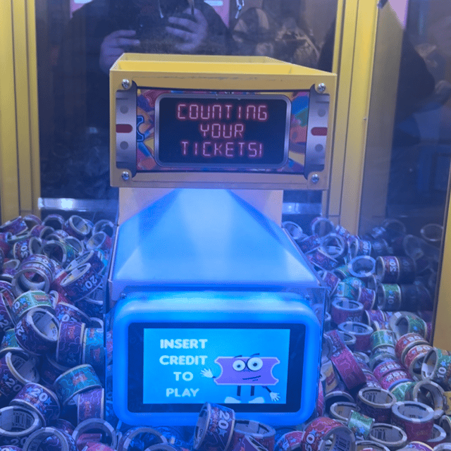 AI ticket Man (tons of Tickets claw machine by ice) AI Voice